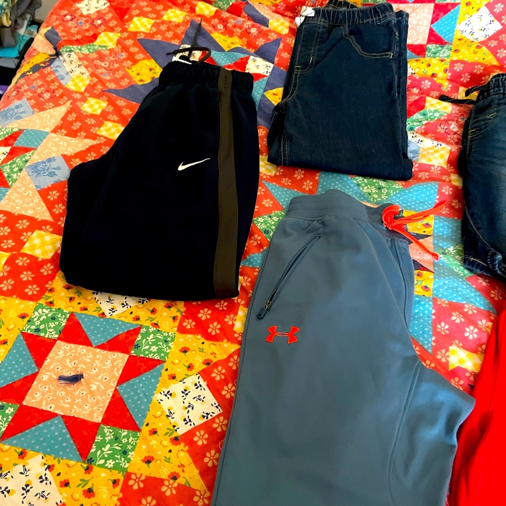 Under Armor and Nike wind breaker pant brand new and and pair of jean brand new